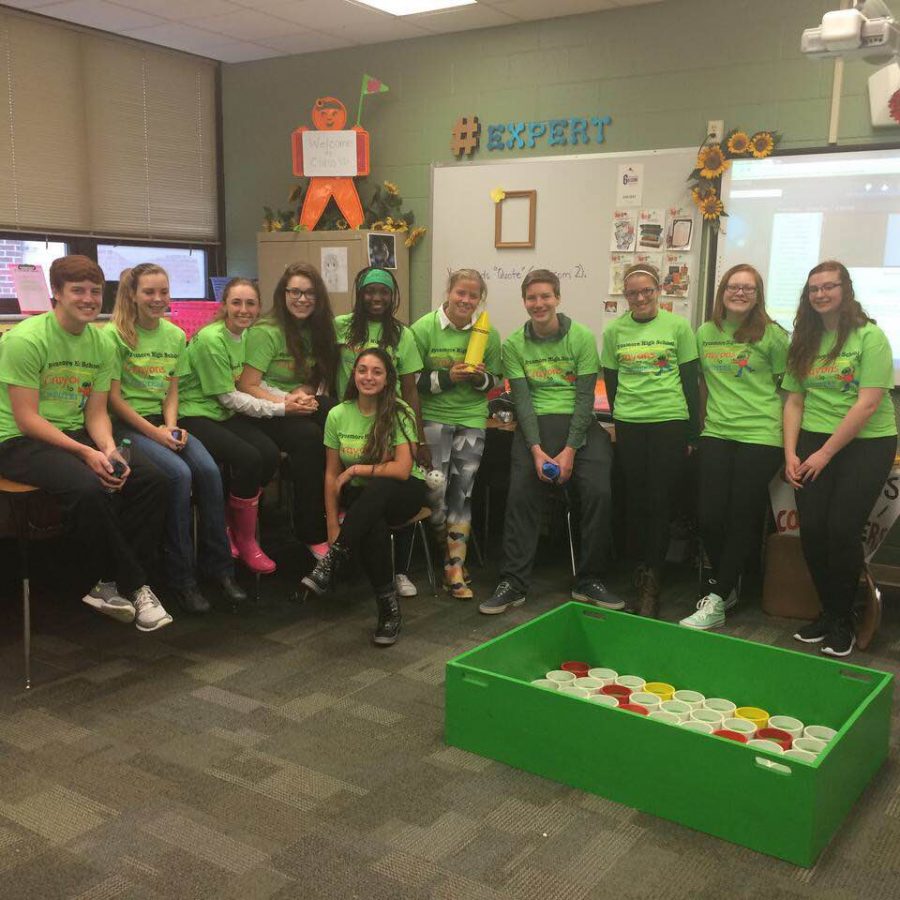 Students who are a part of the Crayons to Computers club volunteering at the Aviator Flight Fest on October 3rd, 2015.  This event took place at Sycamore Junior High School.  Students ran the “Color Dots” game and collected donations for Crayons to Computers, a local non-profit organization.
