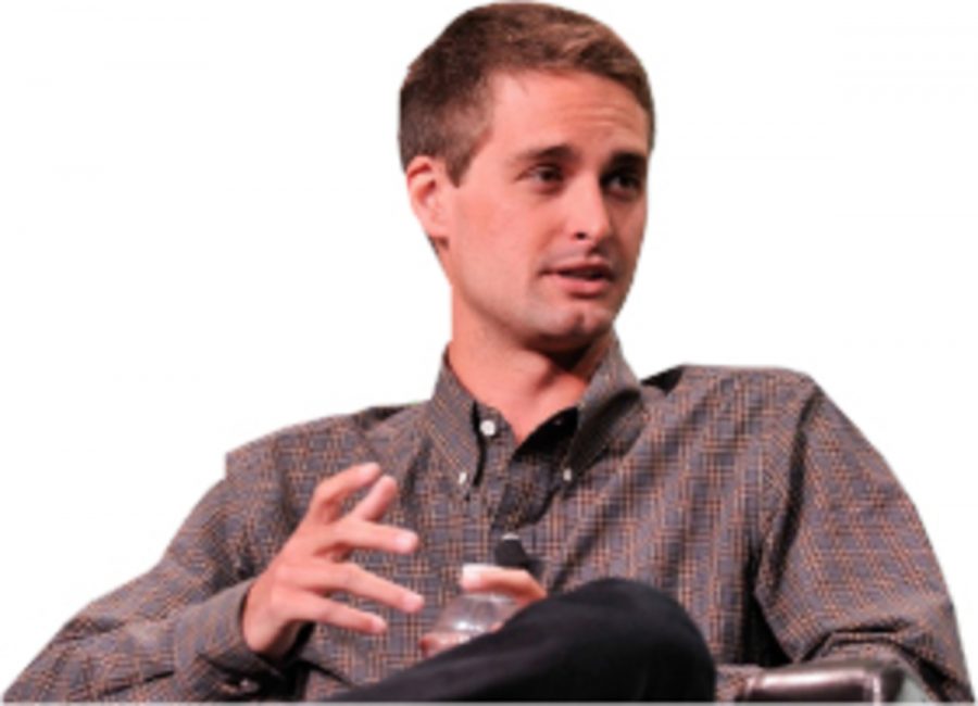 Co-founder of Snapchat 
Evan Spiegel is seen here at a technology convention explaining his application. Spiegel has become extremely wealthy from his business venture in Snapchat.