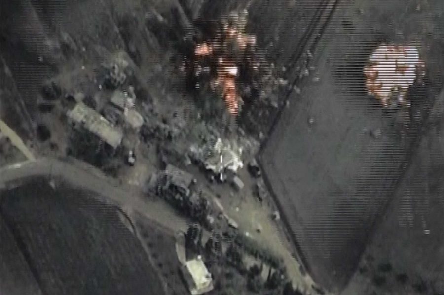 Russia has launched its first pinpoint air strikes against eight Islamic State targets on Sept. 30, 2015 in Syria. Attack jets have hit arms depots, combat vehicles, command and communication centres. All the targets were struck. In the mountainous area, ISIS command point and operations centre were completely destroyed. Video screen grab.  (TASS/Zuma Press/TNS)