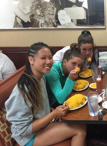 From left to right, seniors Jessica Wei, Paige Parr, and Hannah Schwegmann enjoy skyline. This picture was taken at a team dinner,. in honor of their fundraiser teams. All three girls are on sycamores girls varisty water polo team.