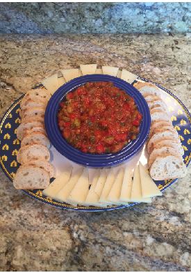 Every year, Spanish IV classes research the numerous regions in Spain and present a project about the interesting cultures and facts about their region. In addition to presenting their project, each student is required to make a dish originating from the region that they researched. Sophomore Matthew Isakson said, “For my project I created a Spanish dish called Pisto Manchego from my region, Castilla La Mancha.”