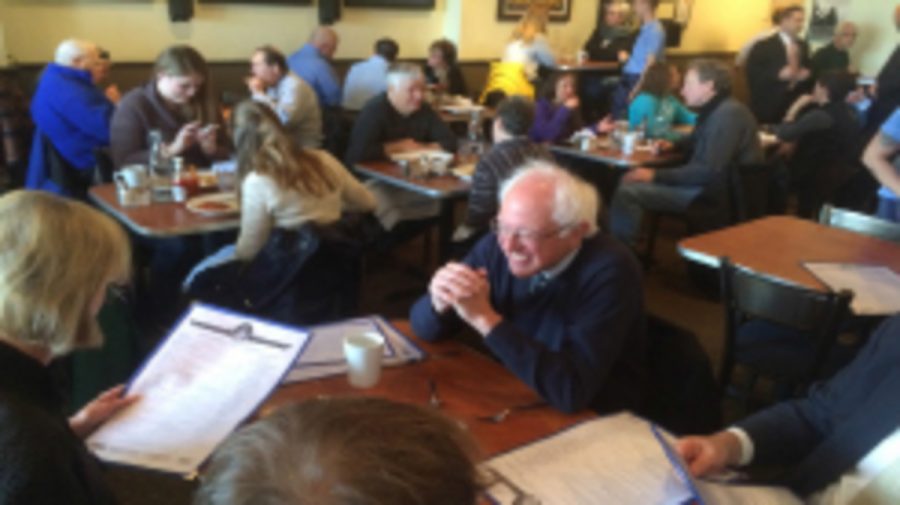 Sanders sits at a cafe in Milwaukee, Wisconsin. His victory over Clinton allows him to slightly close the gap between him and Clinton. If Sanders wins New York, it could boost his numbers significantly.