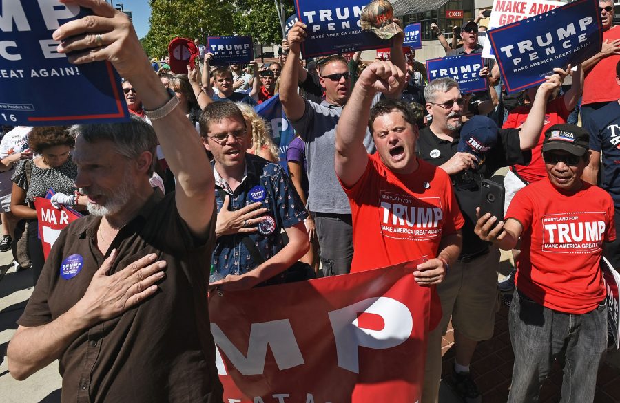 Donald Trump supporters staged a rally on Monday, Sept. 12, 2016 across the street from the Baltimore Convention Center, where Trump addressed a gathering at the National Guard Association of the United States conference. (Kenneth K. Lam/Baltimore Sun/TNS)