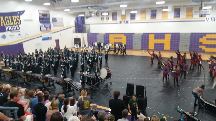 
Marching Band performing in the gymnasium of Bellbrook High School, unknowing the performance is unscored. This ensured marching band gave their second show their all, performing the first two movements of the “Vortex.” The switching of the competition to an exhibition drew out many contrasting feelings from the band.