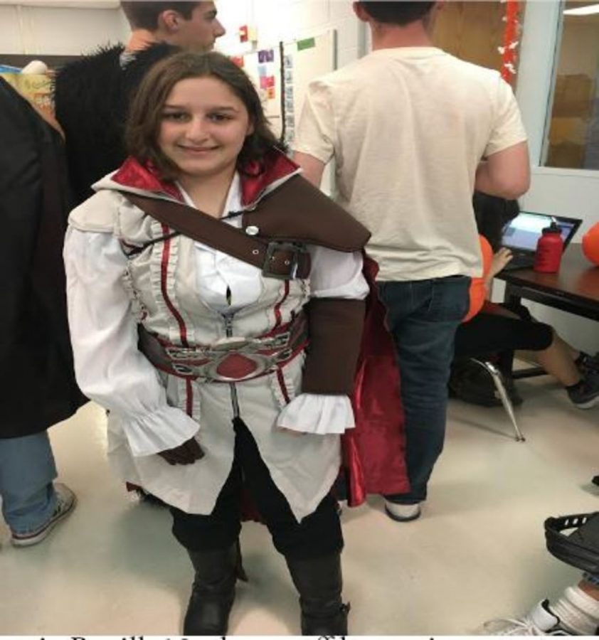 Alyssia Penill, 10, shows off her unique costume for Halloween. The students gathered in room 258 to celebrate the fall occasion. Stepping Out Club’s next meeting will be on November 17 for Thanksgiving. 