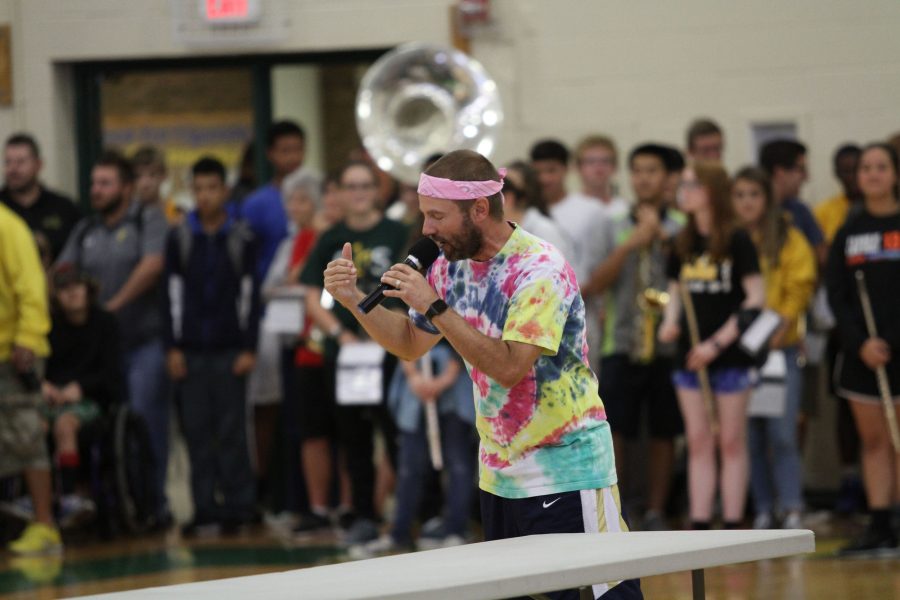 EYES ON ME.  The pep rally leader, Mr. Benjamin Tilton, rallies the students’ excitement.  Mr. Tilton started to lead pep rallies last year.  He has been successful in getting students off their feet.