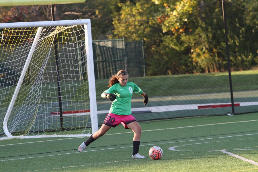 Guarding the goal. Gabby Khodadad (9) kicks the ball at the JV girls Pink out game on Thursday, October 6th. The team played against Colerain. She has been playing for many years, working to improve her skills and hopefully become a Varsity goalie. 