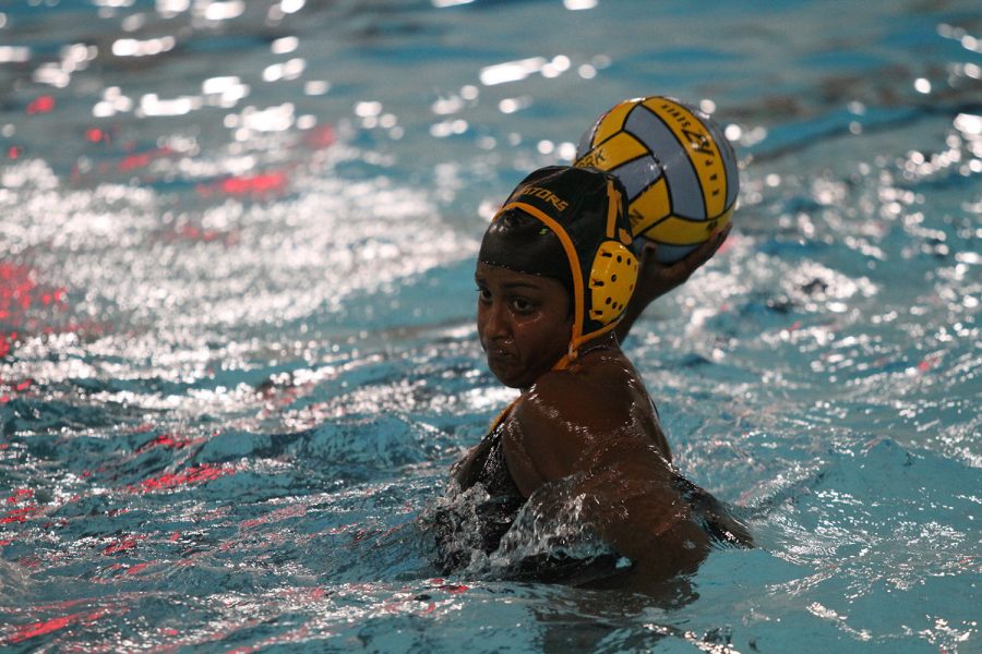 MY SHOT.  Junior Sarah Abraham takes a shot from the five meter line. Abraham was a starting varsity player and has been a member of the SHS water polo team since freshman year. “We ended up doing really well after we were struggling at the beginning of our season,” said Abraham. 