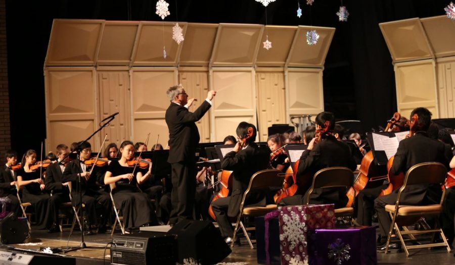 PERFORM.The high school orchestra ensemble plays at their previous concert, their winter concert. Students from the group will now have the chance to perform a piece at the Ohio Music Education Association solo and ensemble competition. The competition will be held on Jan 28, and gives the musicians a new opportunity to expand their musical experience.