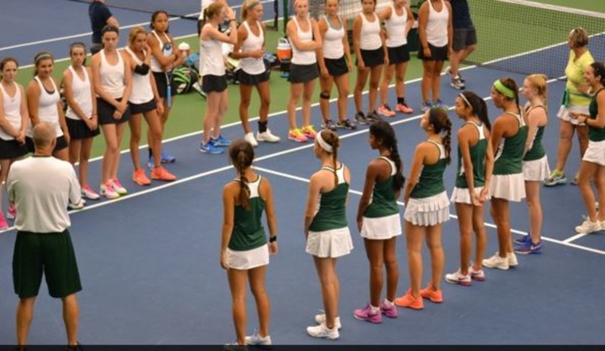 Varsity A girls tennis grinds on the court