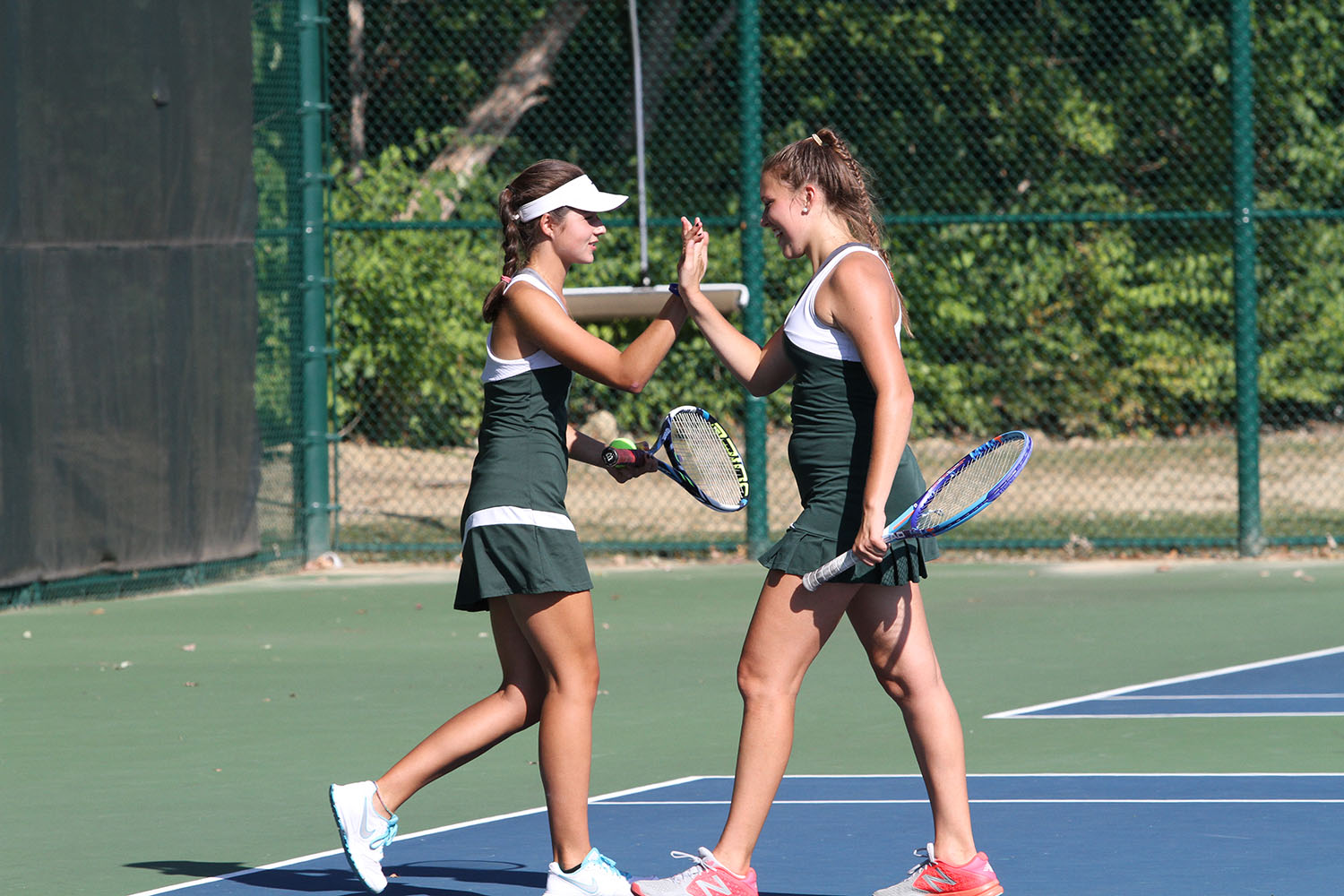 Varsity Green serves it up during the season