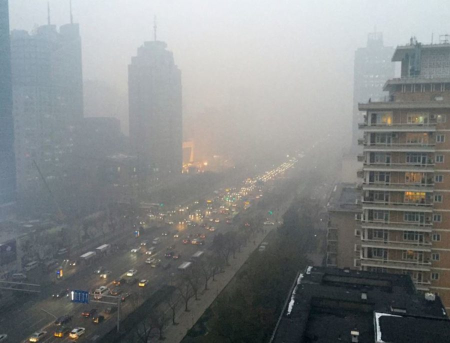 Smog hangs over the city of Beijing’s main boulevard, Chang’an Avenue. The country has recently proposed that they will spend around two billion dollars to reduce air pollution by getting rid of high-pollution releasing vehicles off the roads. Their efforts will take a long time to see results.