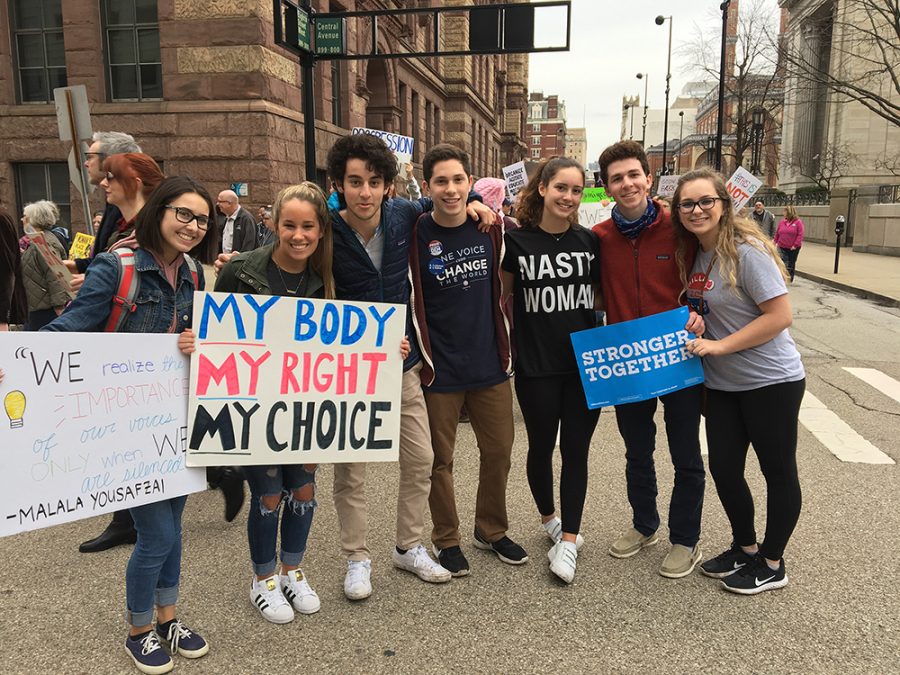 ALWAYS. From left to right: Seniors Sarah Sotropa, Sydney Stewart, Ben Ruskin, Jacob Speigel, and Madelyn Heldman. participate in the women’s march on Sat., Jan. 21 at Washington Park. The march was organized by Billie Mays. Upwards of 10,000 people showed up to the march. 