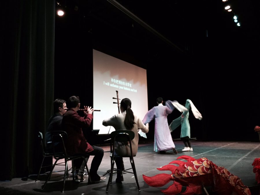 The Chinese opera performs with full musical accompaniment.