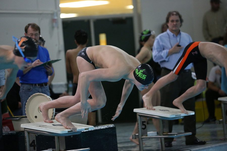 Senior Matthew Schuetz explodes off the block for his 200 freestyle on senior night against Loveland. Schuetz will swim the 100 and 200 freestyle at sectionals and districts in the upcoming weeks. Schuetz will also be on two of the team’s relays. 