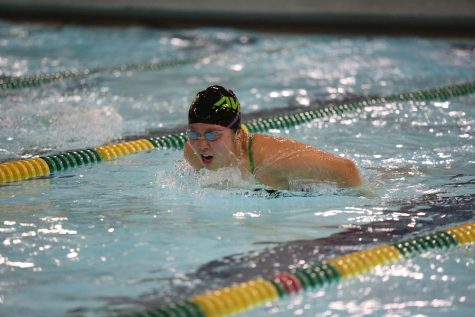 SPRINT. Anita Pan, 11 swims the butterfly stroke during the 200 Individual Medley. As the swim season is drawing to a close, many swimmers return to their club teams. The club team season will usually begin their championship season as well. 