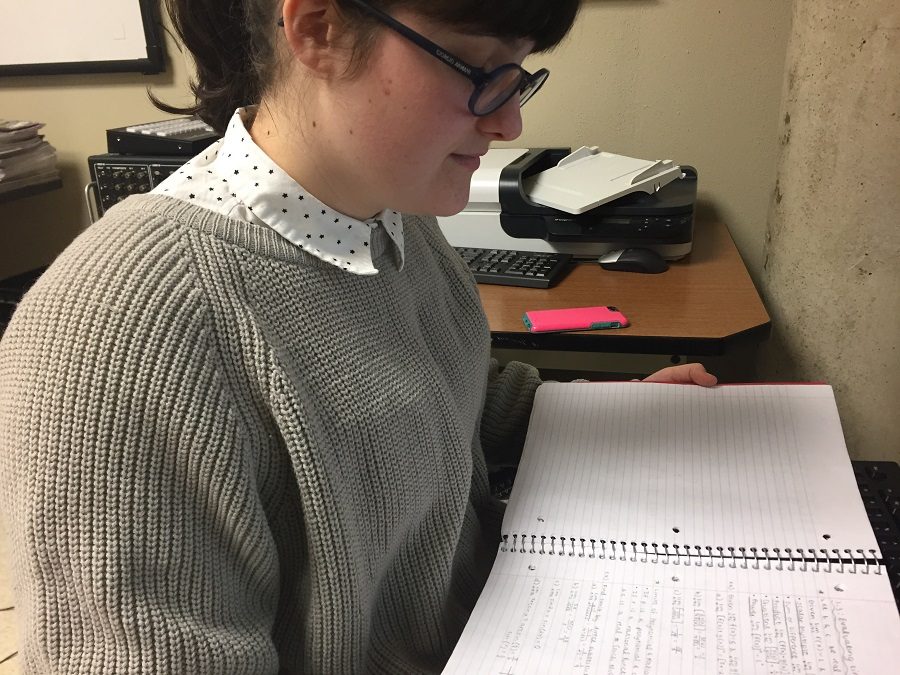 HARD+AT+WORK.+Natalie+Brinkman%2C+11%2C+studies+her+math+notes.+Organizing+and+completing+homework+can+be+difficult%2C+and+it+is+easy+to+feel+unmotivated+during+dreary+winter+days.+Tips+and+tricks+can+be+helpful+in+reworking+your+study+habits+and+keeping+you+on+track+for+the+remainder+of+the+school+year.+Photo+courtesy+of+Anne+Marsh.