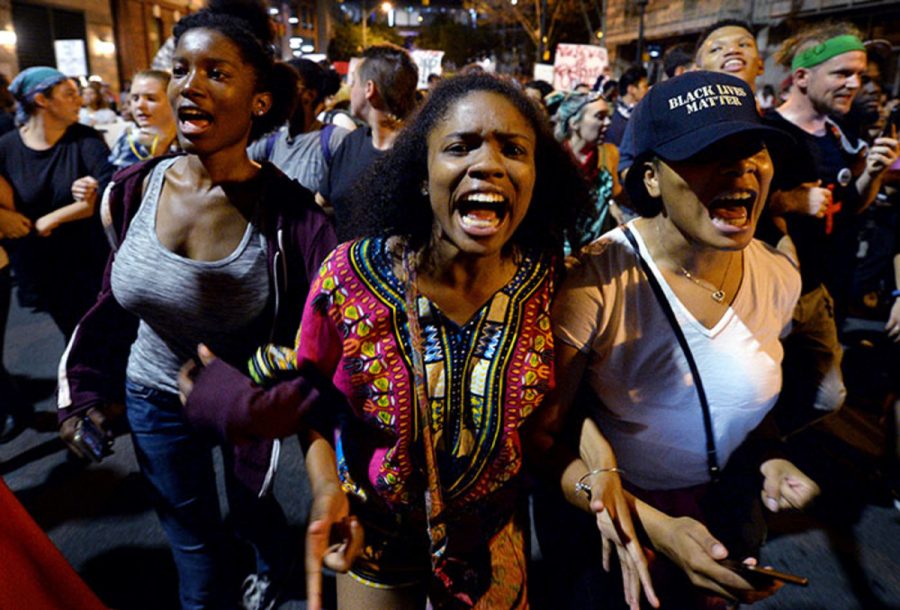 Protesters with the Black Lives Matter movement. They are marching in Charlotte, N.C. They are  following the shooting death of Keith Scott by police. The Black Lives Movement has become a huge, national movement.