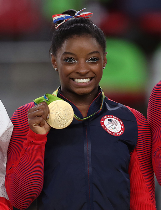 Gold medalist Simone Biles following the Womens Floor Exercise final at the Rio Olympic Arena on the eleventh day of the Rio Olympics Games on Tuesday August 16, 2016 in Brazil. (David Davies/Abaca Press/TNS)