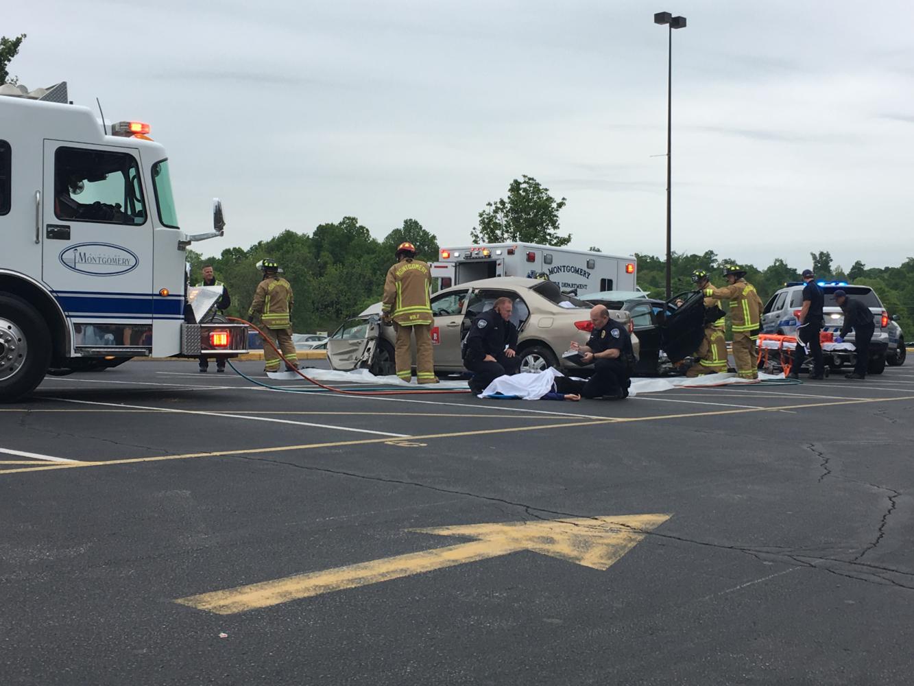 THINK. Office Paul Payne and other firemen and police officers alongside SHS student simulated a car crash. After cutting doors off of cars and taking the “injured” students away in ambulances Officer Payne performed tests on R J Barnes, the student playing the drunk driver. Officer Payne ended the demonstration, talking directly to the students and emphasizing how important it is for students to be safe and use their seat belts for their intended purpose- to save lives.