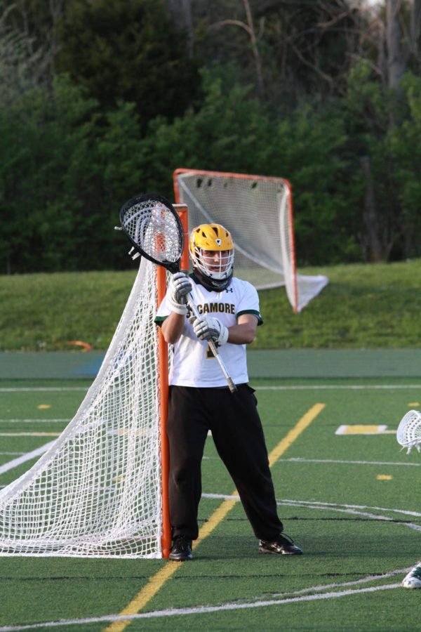 SAVE. Evan Schuster, 12, is the goalie for the Varsity boys’ Lacrosse team. He has recently committed to Indiana Tech for lacrosse. He is also the second all-time goalie for career saves.