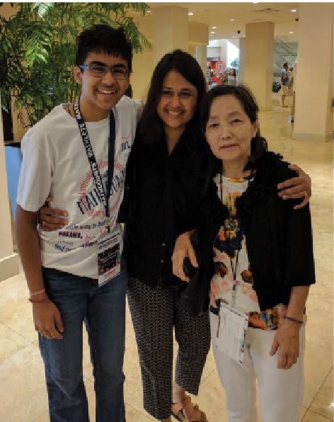 ALL SMILES. Verma celebrates along with his mother and professor at the MATHCOUNTS Nationals. At the competition, Verma ranked 29th place. The competition consisted of students in grades six, seven, and eight. 