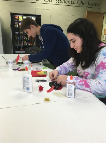 CREATIVITY. French club participates in seasonal activities throughout the year. Students made masks for Mardi Gras, collected donations after the hurricane in Haiti, and made gingerbread houses in December. This year, the club hopes to continue it’s engaging activities. 