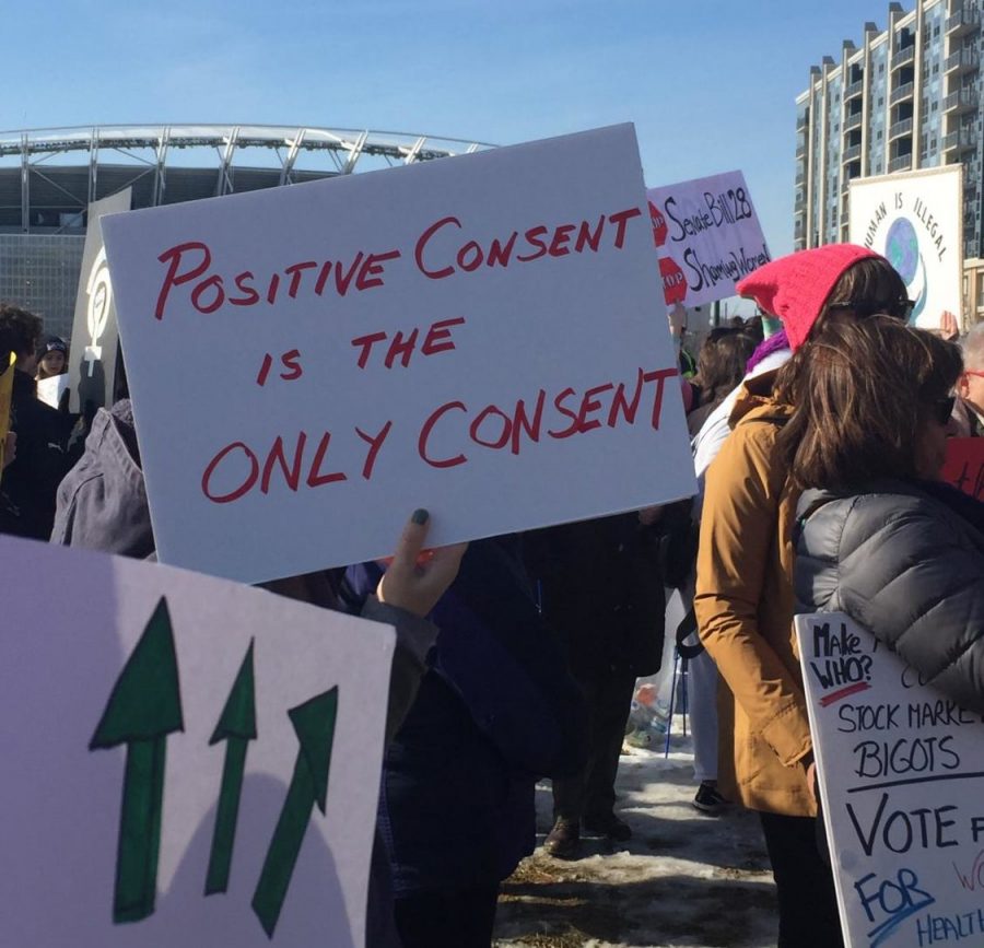 CONSENT. A participant in Cincinnati’s Women’s March holds a sign that reads: “Positive consent is the only consent.” Sexual assault stories are being shared worldwide via the #MeToo movement, and an exhibition in Belgium featuring victims’ clothing worn at the time they were assaulted seeks to cease the belief that clothing determines consent. “I believe in the power and rights of women, and no matter what someone is wearing, it does not excuse another person’s vile actions,” said Thea Ferdinand, 12.