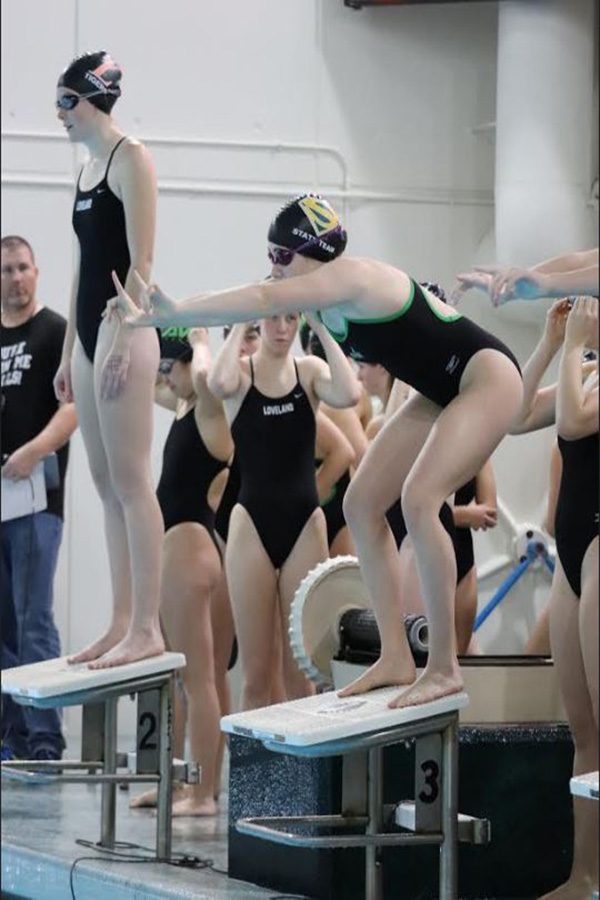 RACE PACE. Junior Ania Campbell prepares to swim the butterfly leg of the relay. At meets, Campbell often competes in two relays and two individuals, swims of either freestyle or butterfly. This year, she hopes to make districts for the 100 butterfly. Photo by Ania Campbell.