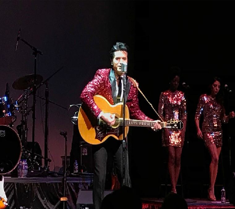 ELVIS PRESLEY. On the stage, Dean Z, an Elvis impersonator, performs for the School of Creative and Performing Arts (SCPA) fundraiser. Dean Z. is singing “Stand by Me” by Ben E. King. “This is where we want to help,” said Larry Burgmen, co-chairman of the fundraiser.