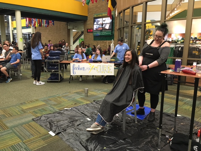 Fashion for the Cure cuts hair for awareness