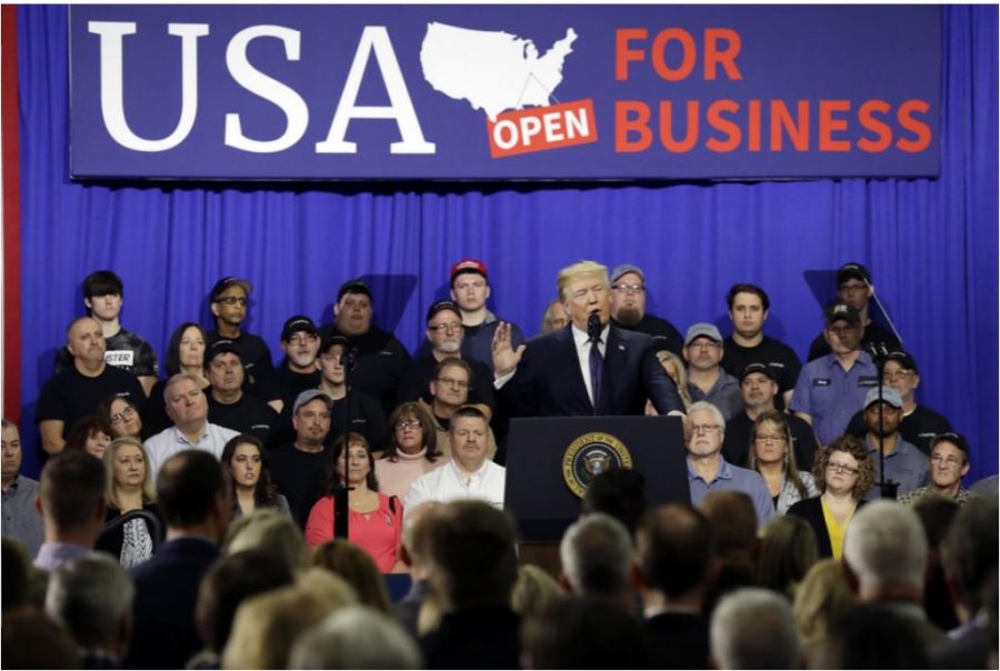 ONE TEAM. President Donald Trump speaks about his tax plan and the benefits that families and individuals will receive from it at the Sheffer Corp. on Mon., Feb. 5. He claims that the families in Ohio will see a tax cut of more than $8 billion in just this year, focusing on how workers in particular will reap the benefits. “We are one team, one people, one family saluting one country,” Trump said, when talking about the workers and families in the crowd.