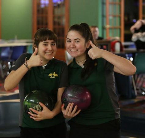THUMBS UP. Junior Paige Weitz and sophomore Nova Dugan-Mezensky smile at the camera while practicing. This year, SHS’s girls bowling team is made up of only three girls: Weitz, Dugan-Mezensky, and junior Rachel Izworski. Weitz represented them at state.