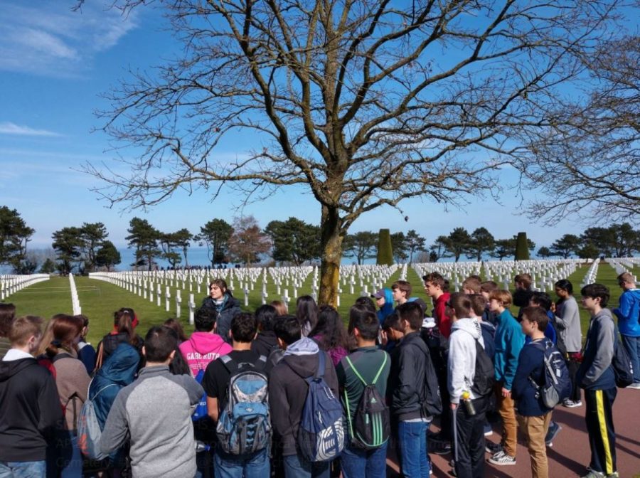 HONOR. AP European History students honor Americas fallen at the Normandy American Cemetery. This was one of the stops they made during their trip to Europe, which lasts over a week. They previously visited Paris, where they toured places such as the Eiffel Tower and the Louvre.