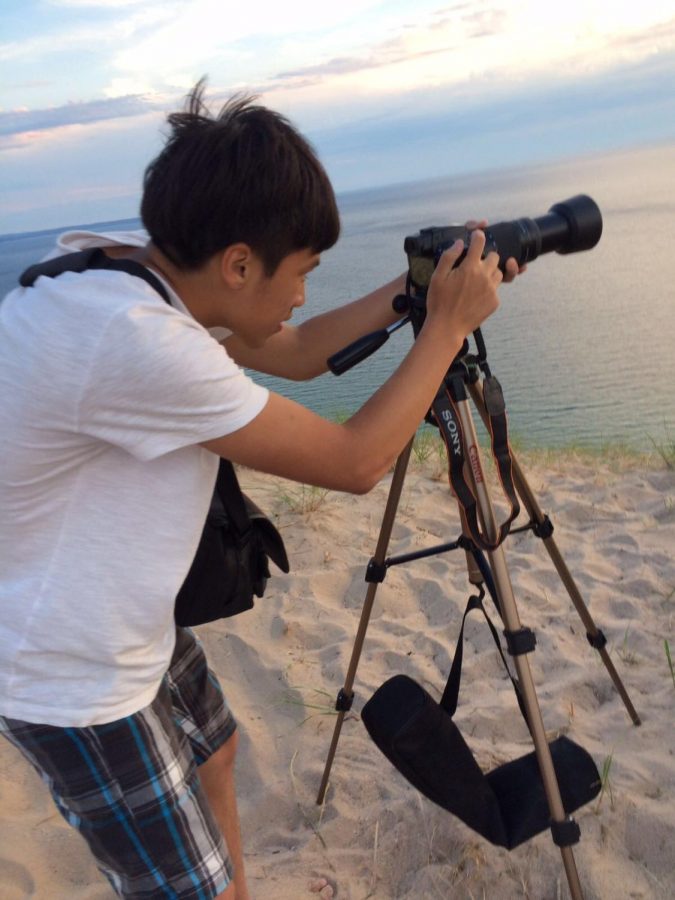 SNAPSHOT. Tsao stops to take a photo on his trip to Sleeping Bear Dunes, located in Michigan. Tsao was trying to capture the beautiful sunset. When traveling, Tsao enjoys capturing photos of what he sees along the way. Photos courtesy of Herrick Tsao. 
