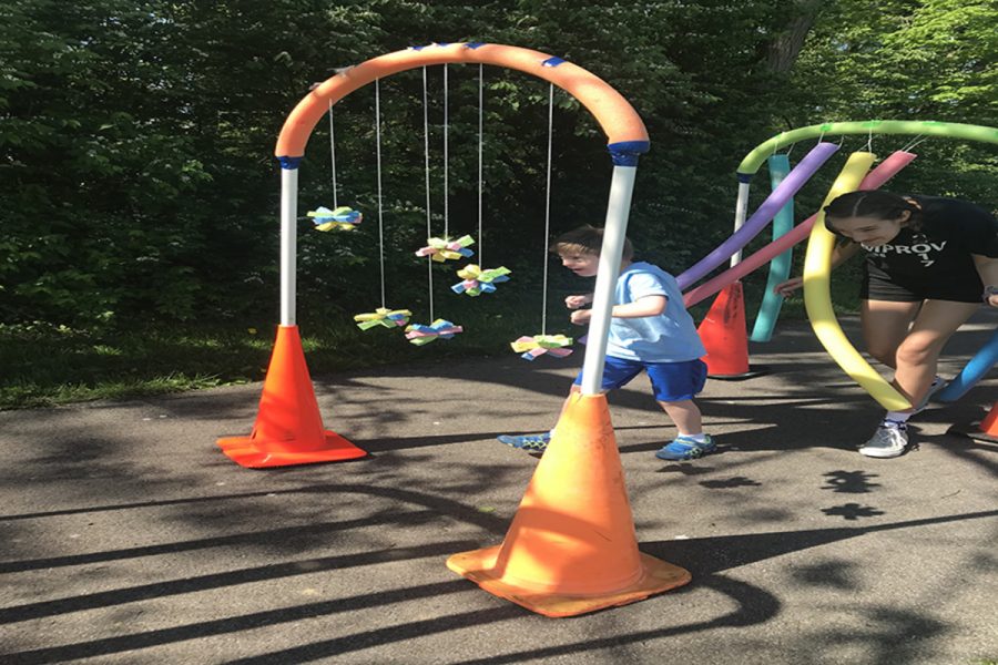 OBSTACLE COURSE. Students in TPA created this activity for field day. The course accommodated all students. Some of the items making up the course included pool noodles, cones, hoops, and sponges. 