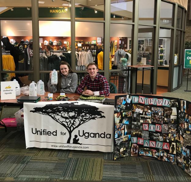 TRANSITION. Former U4U officers seniors Julia McDowell and Jeremy Pletz are at a fundraising booth for sponsoring a Ugandan children. Officers were replaced through submissions and were announced. Next year has high expectations awaiting U4U.