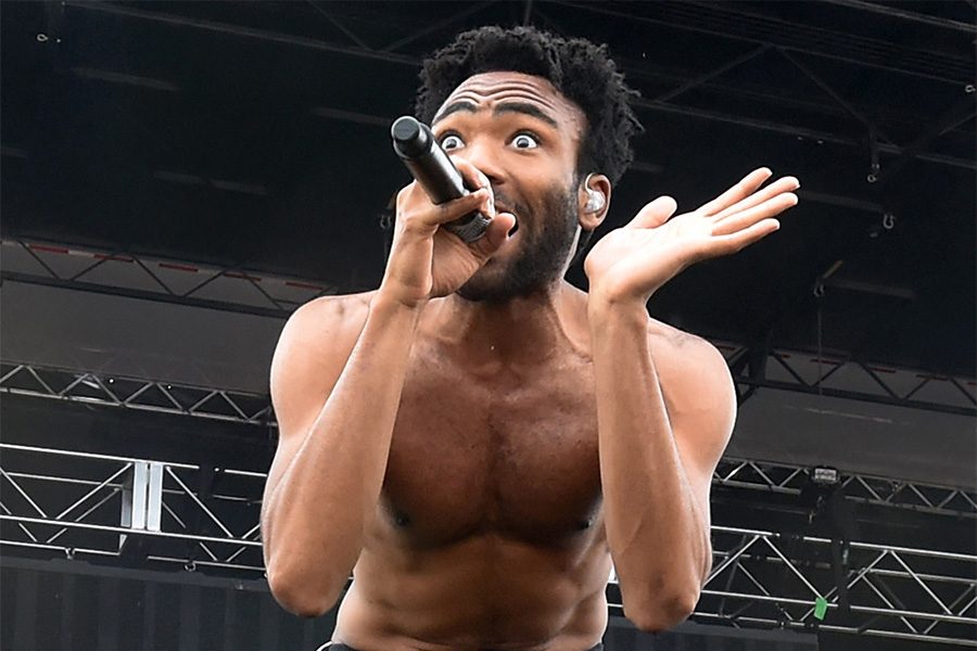 IS+THIS+AMERICA%3F+Gambino%E2%80%99s+music+video+sparks+large-scale+discussion+on+the+Internet.+Although+fans+are+racking+their+brains+for+the+meaning+behind+every+symbol+in+the+song%2C+Gambino+himself+is+keeping+silent+on+the+matter.+%E2%80%9CI+just+wanted+to+make%2C+you+know%2C+a+good+song.+Something+people+could+play+on+Fourth+of+July%2C%E2%80%9D+said+Gambino+mysteriously+when+E%21+asked+the+artist+about+his+thought+when+writing+the+song.+After+his+comment%2C+Gambino+smiled+and+resisted+further+inquiry.+