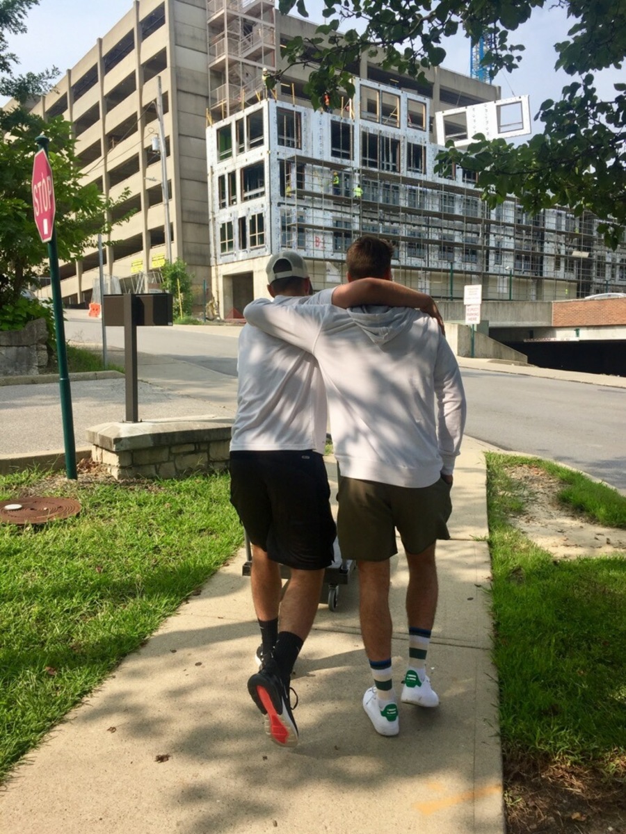 BROTHERLY LOVE. Twins and recent SHS graduates Alex and Grayson Thornberry take a walk on the campus of the University of Cincinnati, where Grayson Thornberry had just moved into a dorm room for his freshman year. Though both brothers will be heading to college this year, they will be separated by hundreds of miles and leave behind two dogs and two parents.