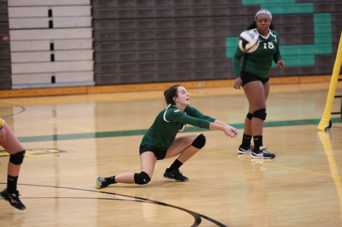 Girls volleyball bonds on court