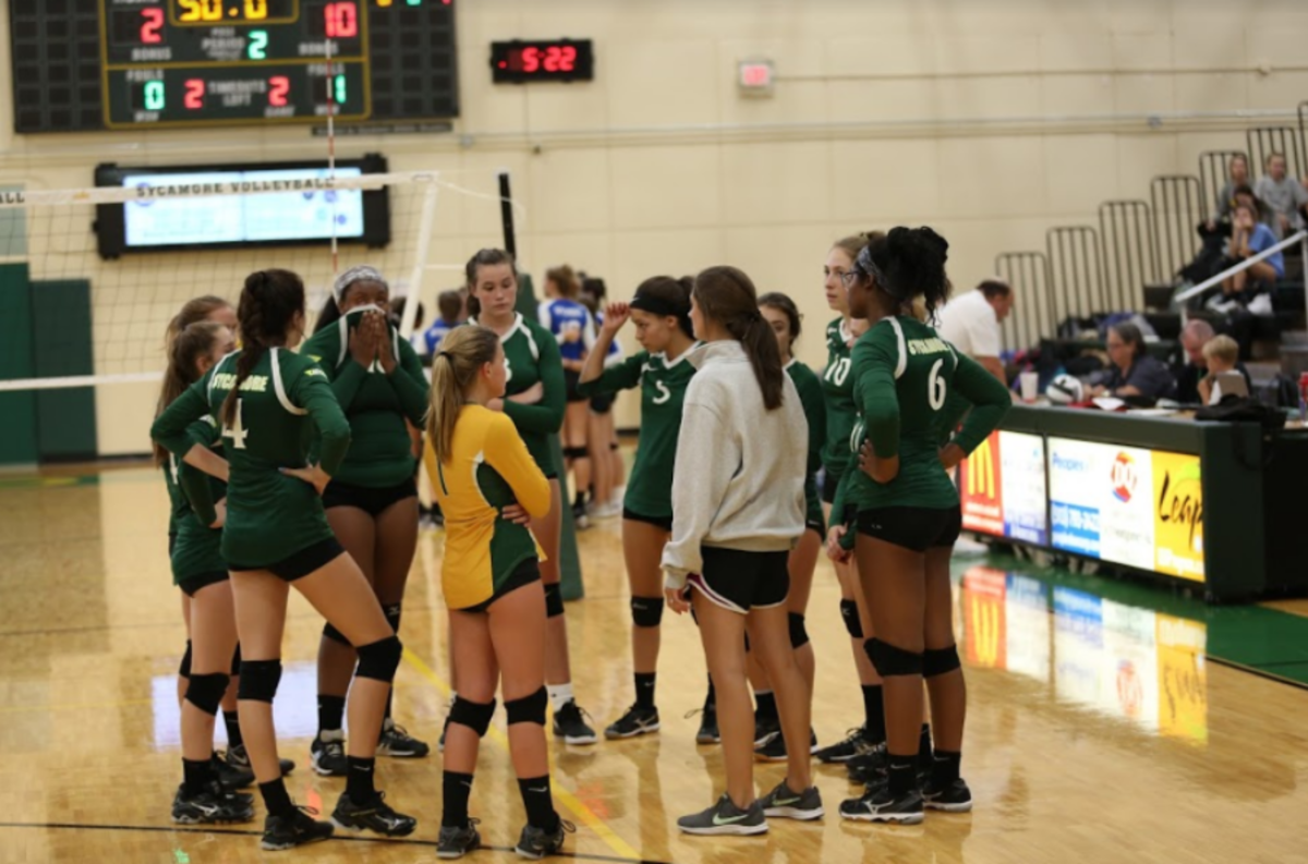 Girls volleyball bonds on court