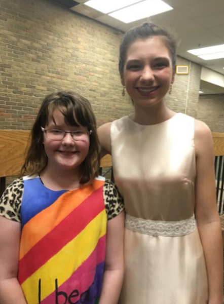 SMILE AND POSE. Audrey Simons poses with her dragonfly from the 2017 Fashion for the Cure Show. Simons designed and sewn her dress in 30 days, and modeled it herself at the show. “I love hanging out with dragonflies,” Simons said. 
