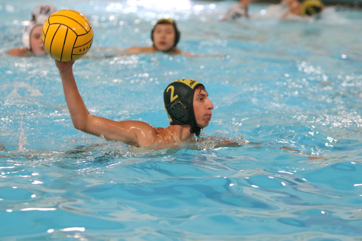 Boys JV Water Polo swims past competition