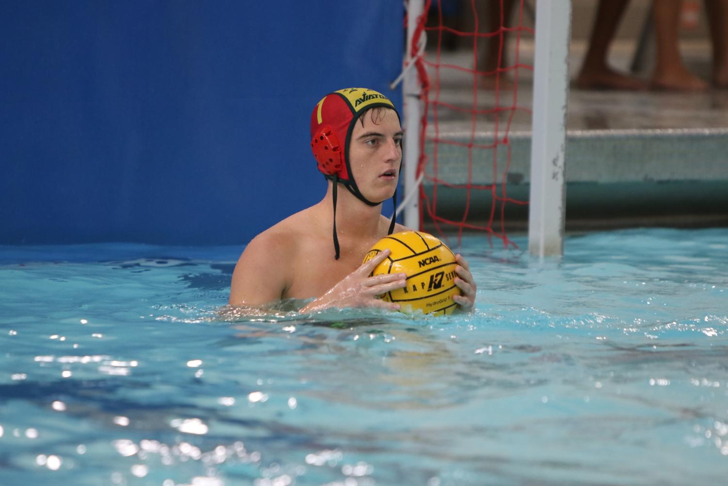 Boys JV Water Polo swims past competition