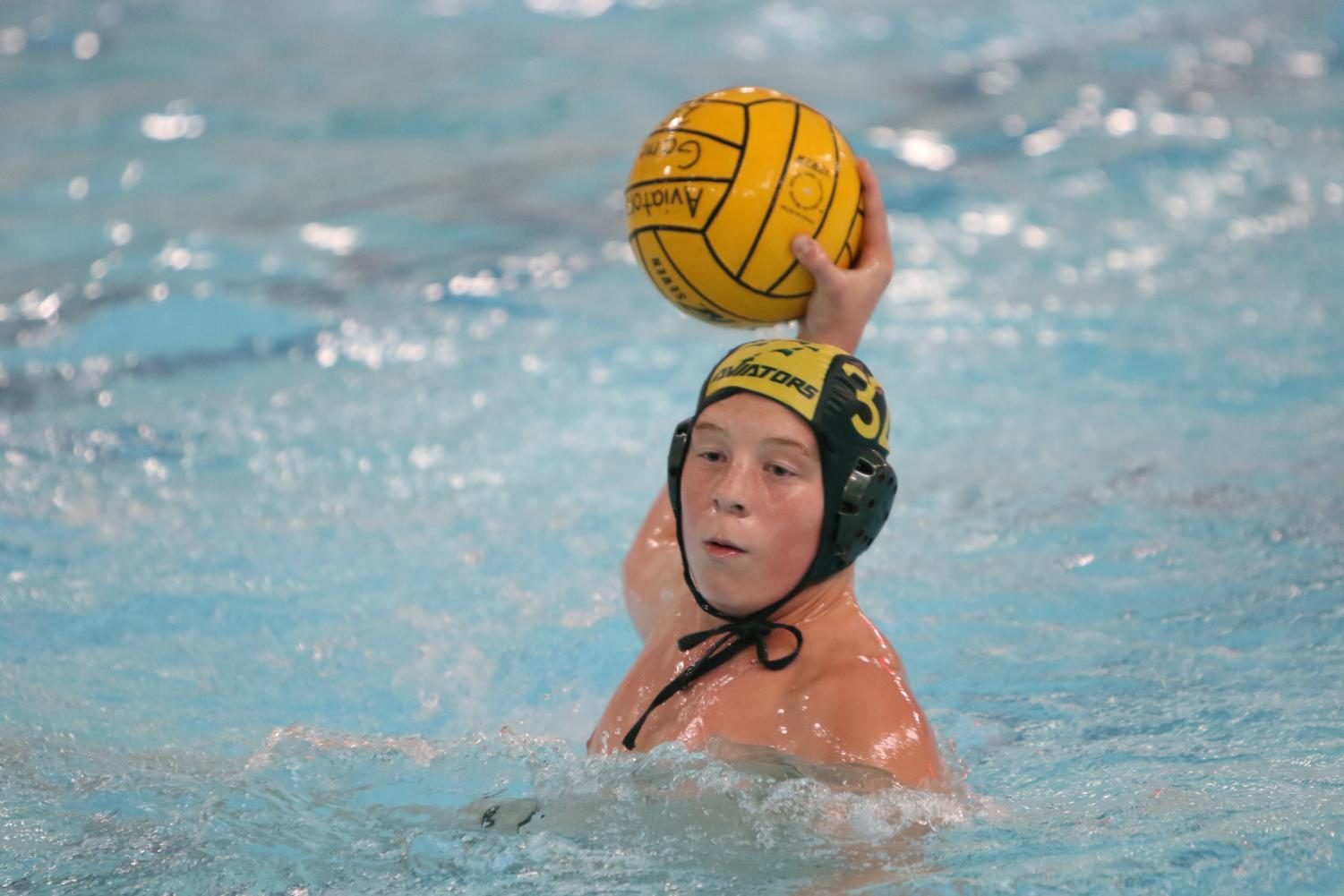 Boys JV Water Polo swims past competition