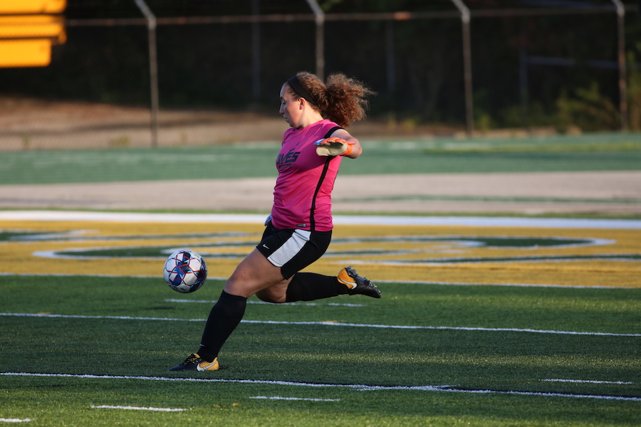 Girls Varsity Soccer plays, bonds