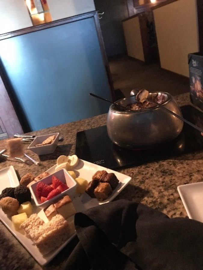 YUM. The silver pot is mixed with steaming chocolate and a huge marshmallow and graham crackers. On the side, you have the wonderful selections of fruit and tasty treats to dip in the fondue. “The strawberries were the best part,” said Lily Banke, 11. 