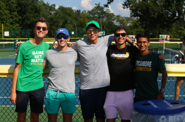 WE ARE FAMILY. The SHS Tennis Program reminds the Sycamore Community of what it means to have good sportsmanship while still playing the game. Junior High Spanish Teacher Michael Teets is the coach of Boys and Girls Varsity Tennis. The boys were 2016, 2015, and 2014 GMC Championships. The girls were 2014 (gold team) and 2012 GMC Champs. In addition, multiple players have gotten awards such as double champions or runner up. Sycamore Tennis has never disappointed. “Being part of the tennis team is great because you always know that someone will be there to cheer you on during a match or someone to talk to during school since we are like one big family.” said senior Edward Wade. 