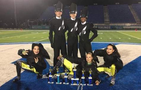 Marching Band pushes through windy weather