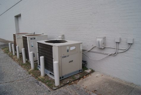 WOW. This photo shows a line of air conditioners. The state of Ohio is debating passing a bill that will use school funds to provide air conditioning in the whole school. This is because students' performance is impeded when the climate is not ideal.